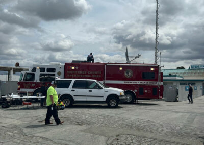 Red response vehicle and white truck