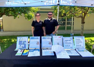 Two CalOES ESCs at an information table.