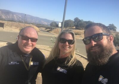 Three Coastal Region ESCs take a photo.